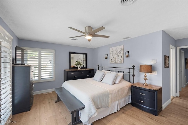 4613 Compass Rose Unit 11, Vermilion, OH 44089 - bedroom featuring light wood-style floors and ceiling fan