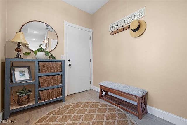 4613 Compass Rose Unit 11, Vermilion, OH 44089 - entrance foyer with wood finished floors and baseboards