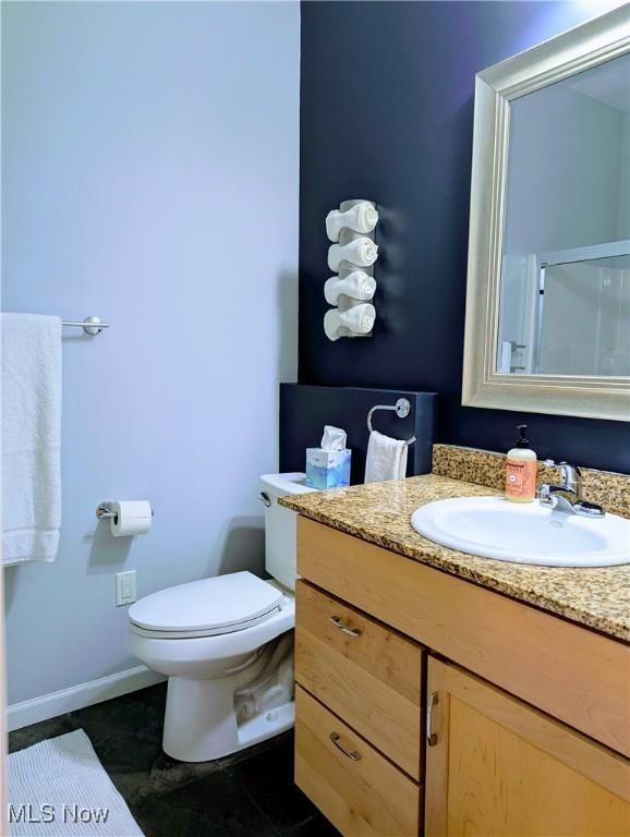 1949 Columbus Rd, Cleveland, OH 44113 - full bath featuring vanity, a shower with door, and tile patterned flooring