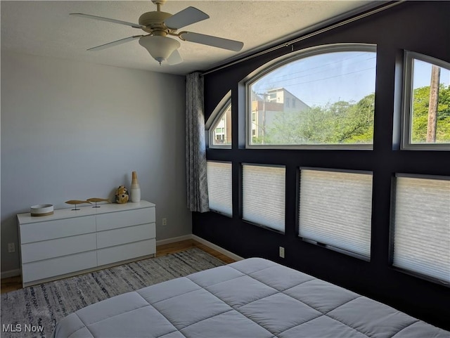 1949 Columbus Rd, Cleveland, OH 44113 - bedroom featuring wood finished floors and ceiling fan