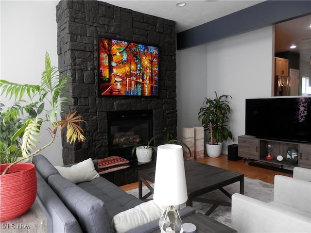 1949 Columbus Rd, Cleveland, OH 44113 - living area featuring wood finished floors and a fireplace