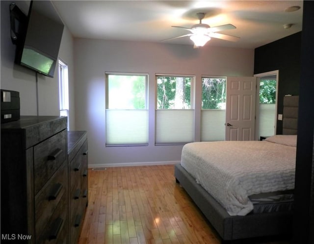 1949 Columbus Rd, Cleveland, OH 44113 - bedroom featuring light wood finished floors and ceiling fan