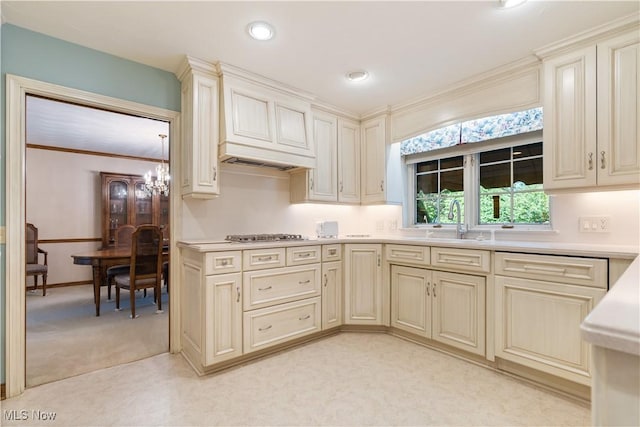 221 Winston Ave NE, North Canton, OH 44720 - kitchen featuring cream cabinets, light countertops, light colored carpet, recessed lighting, and ornamental molding