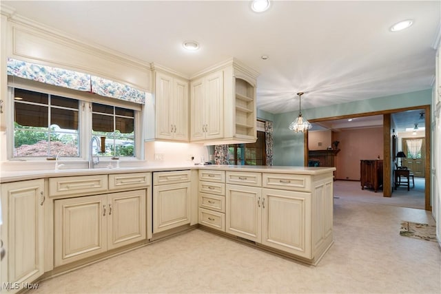 221 Winston Ave NE, North Canton, OH 44720 - kitchen with cream cabinets, light carpet, open shelves, a peninsula, and recessed lighting