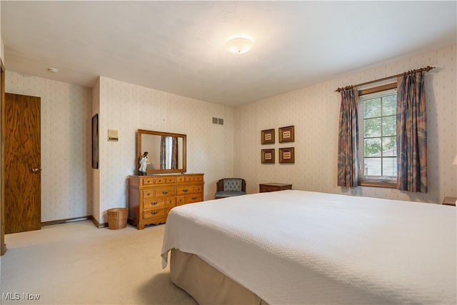221 Winston Ave NE, North Canton, OH 44720 - bedroom featuring light carpet and wallpapered walls