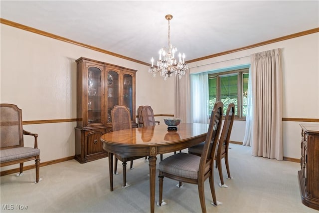 221 Winston Ave NE, North Canton, OH 44720 - dining room with a chandelier, light carpet, and crown molding