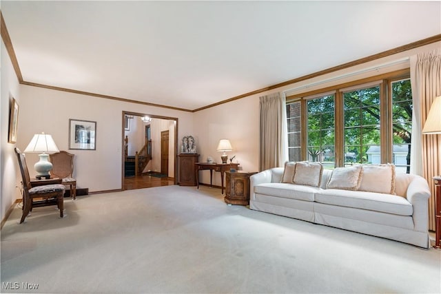 221 Winston Ave NE, North Canton, OH 44720 - carpeted living area with crown molding and stairway