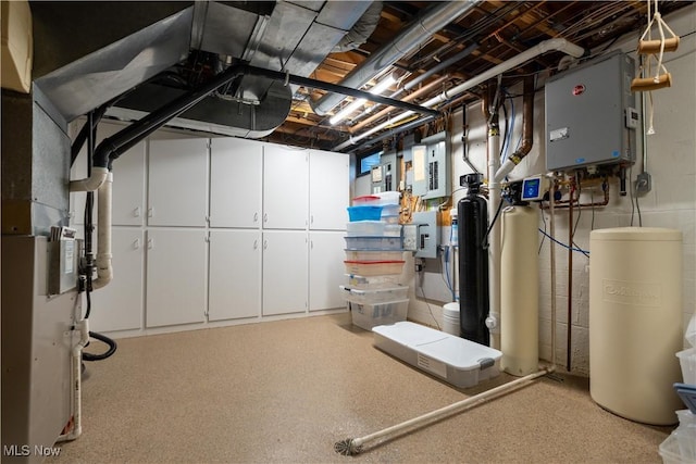 221 Winston Ave NE, North Canton, OH 44720 - unfinished below grade area with electric panel, a water softener system, and concrete block wall