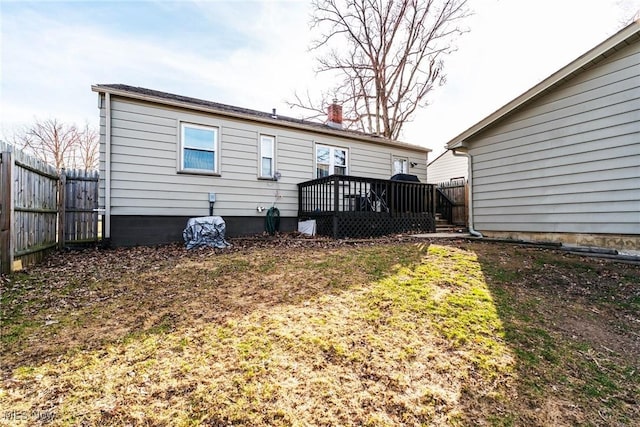 3214 Quentin Dr, Youngstown, OH 44511 - back of house featuring a deck, a fenced backyard, and a chimney