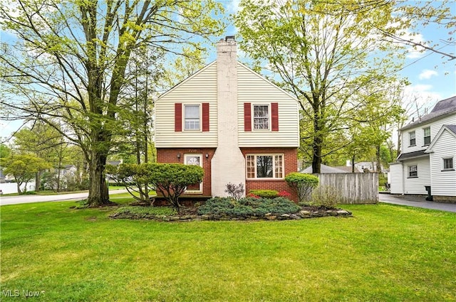 7219 N Lima Rd, Poland, OH 44514 - view of side of home with brick siding and a chimney