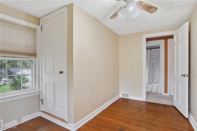 7219 N Lima Rd, Poland, OH 44514 - empty room with wood finished floors and ceiling fan