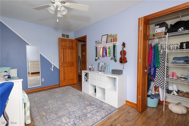 121 Sycamore Pl, Oberlin, OH 44074 - bedroom featuring wood finished floors, a closet, and a ceiling fan