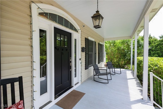 121 Sycamore Pl, Oberlin, OH 44074 - view of exterior entry featuring a porch