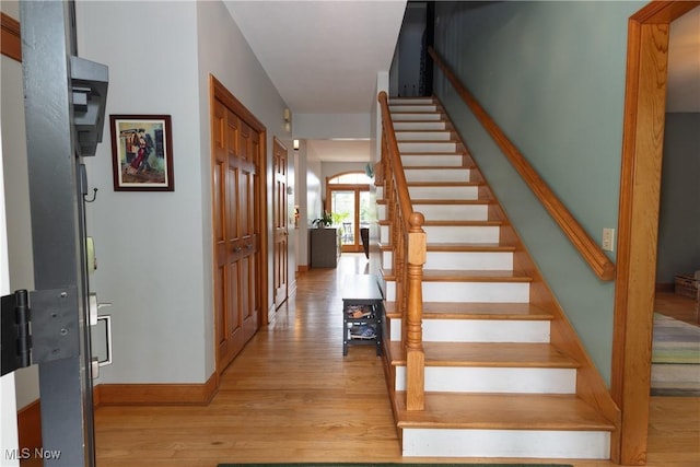 121 Sycamore Pl, Oberlin, OH 44074 - staircase featuring wood finished floors and baseboards