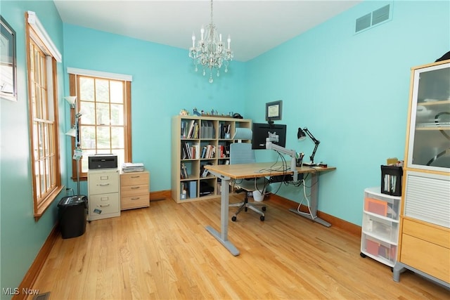 121 Sycamore Pl, Oberlin, OH 44074 - office featuring wood finished floors and a chandelier