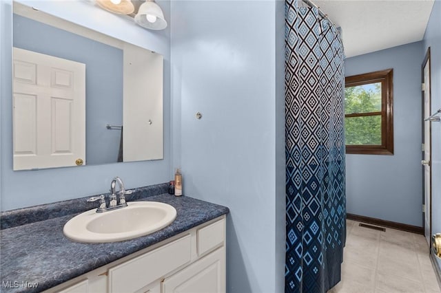 1345 County Road 16, New London, OH 44851 - bathroom with vanity, a shower with curtain, and tile patterned floors