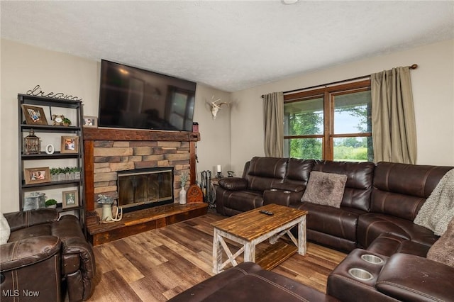1345 County Road 16, New London, OH 44851 - living area with wood finished floors and a stone fireplace