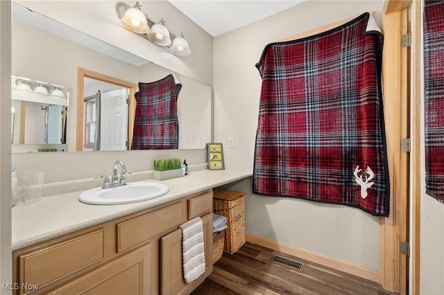 1345 County Road 16, New London, OH 44851 - bathroom with wood finished floors and vanity
