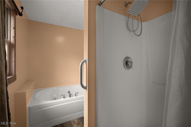 1345 County Road 16, New London, OH 44851 - full bath with a whirlpool tub, curtained shower, and wood finished floors