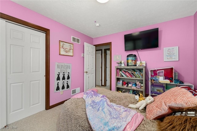 1345 County Road 16, New London, OH 44851 - carpeted bedroom with a textured ceiling