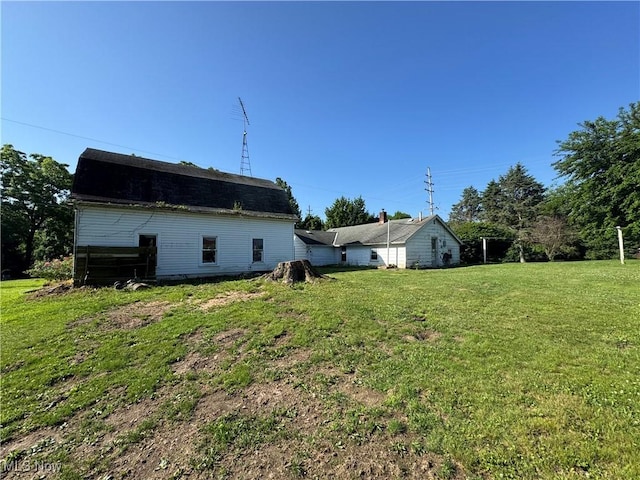 7138 Jefferson Rd, Ashtabula, OH 44004 - back of property featuring a lawn