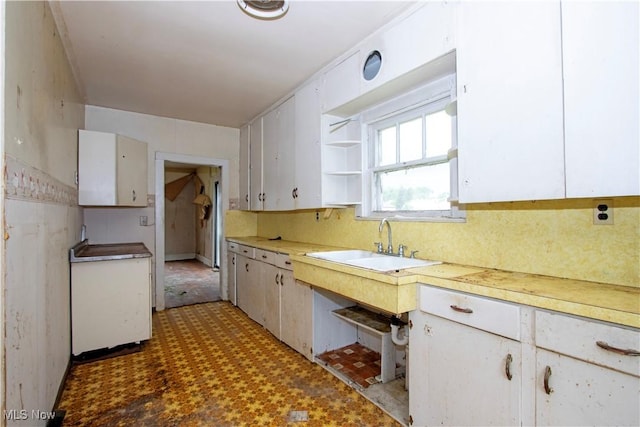274 E S St, Shreve, OH 44676 - kitchen featuring decorative backsplash, open shelves, light countertops, and white cabinets