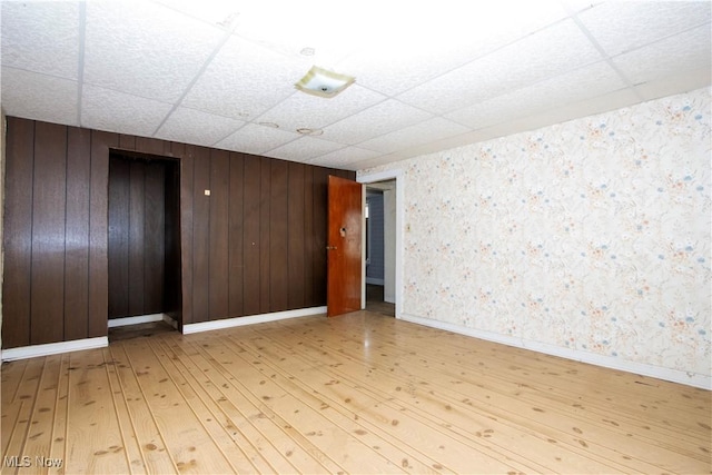 274 E S St, Shreve, OH 44676 - empty room featuring a drop ceiling and wood finished floors