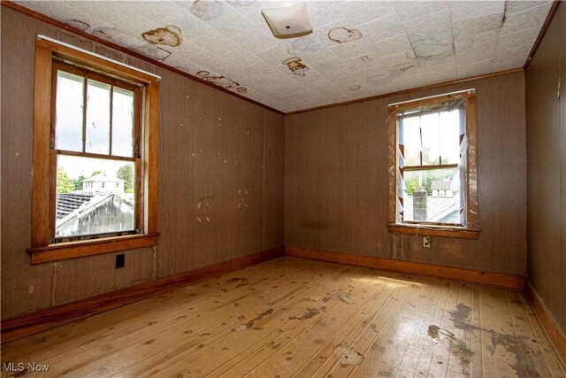 274 E S St, Shreve, OH 44676 - empty room with hardwood / wood-style floors and crown molding