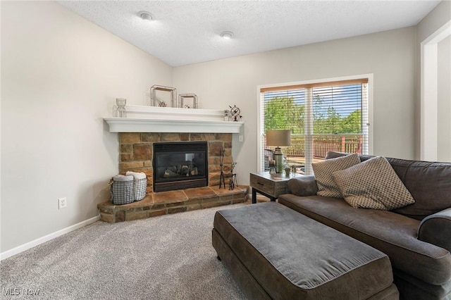 4670 King Meadow Trl, Kent, OH 44240 - living area featuring carpet floors, a fireplace, and a textured ceiling