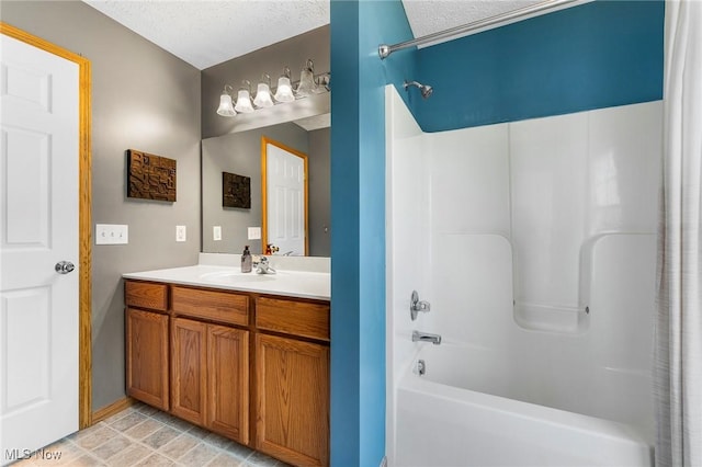 4670 King Meadow Trl, Kent, OH 44240 - bathroom with tub / shower combination, vanity, and a textured ceiling