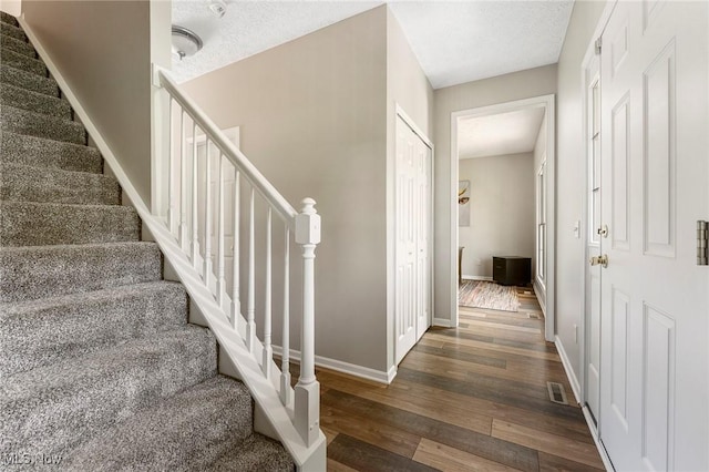 4670 King Meadow Trl, Kent, OH 44240 - staircase featuring wood finished floors and baseboards