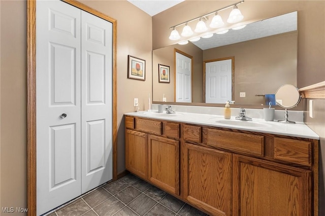 4670 King Meadow Trl, Kent, OH 44240 - bathroom with double vanity, tile patterned flooring, and a closet