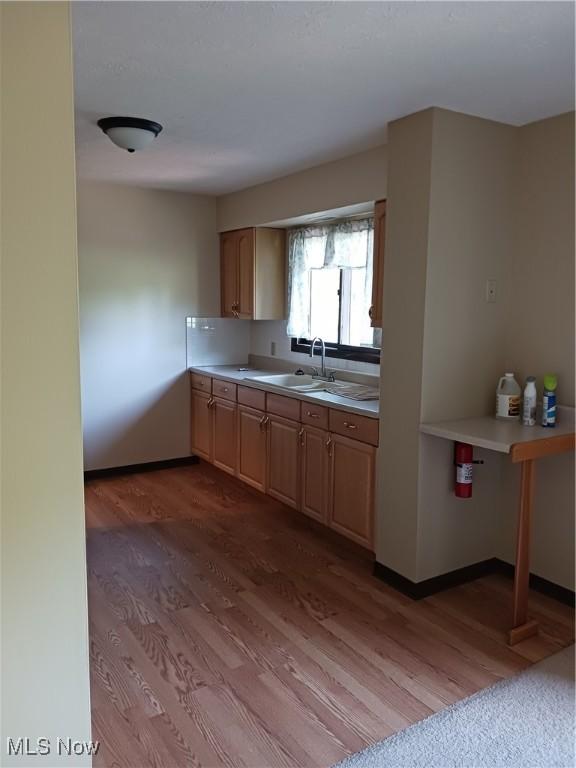 14172 Hametown Rd, Doylestown, OH 44230 - kitchen with wood finished floors and light countertops