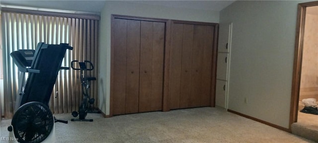 14172 Hametown Rd, Doylestown, OH 44230 - bedroom featuring light colored carpet and two closets