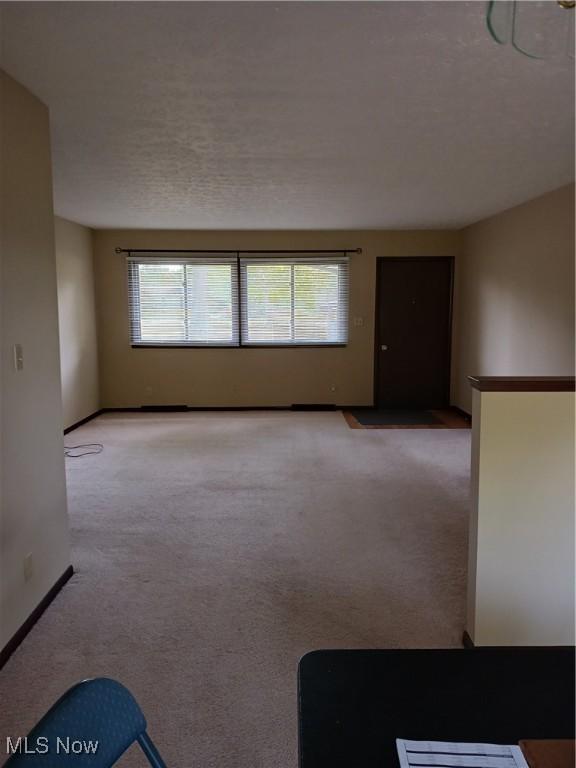 14172 Hametown Rd, Doylestown, OH 44230 - spare room with light colored carpet and baseboards