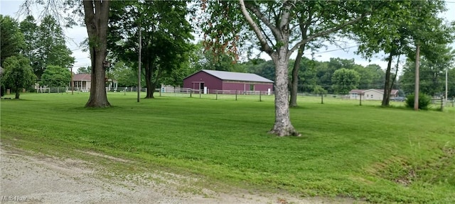 14172 Hametown Rd, Doylestown, OH 44230 - view of yard with a pole building, an outdoor structure, and view of wooded area
