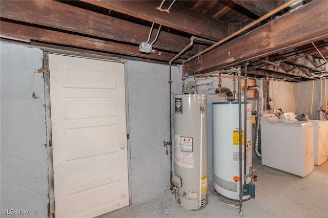 1431 Rowley Ave, Cleveland, OH 44109 - unfinished below grade area featuring water heater and washer and dryer