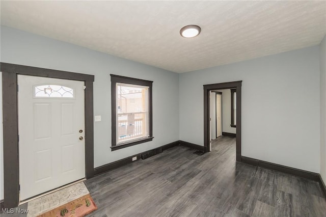 1431 Rowley Ave, Cleveland, OH 44109 - entrance foyer with dark wood-style flooring