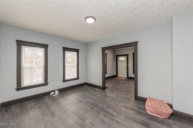 1431 Rowley Ave, Cleveland, OH 44109 - empty room with wood finished floors and baseboards