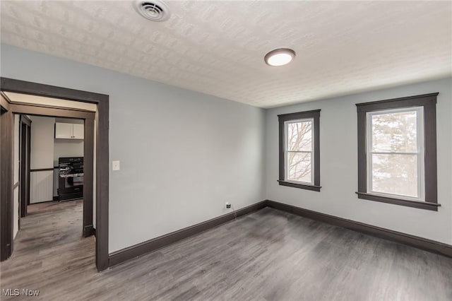1431 Rowley Ave, Cleveland, OH 44109 - unfurnished room with wood finished floors