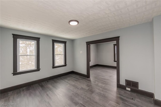 1431 Rowley Ave, Cleveland, OH 44109 - spare room featuring wood finished floors