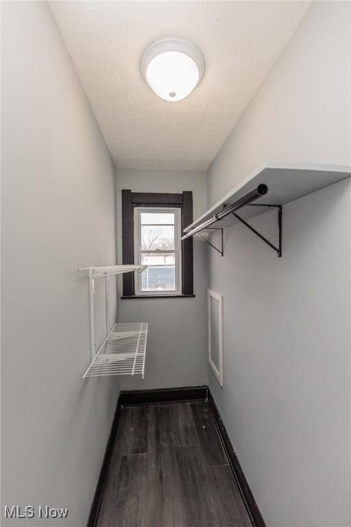 1431 Rowley Ave, Cleveland, OH 44109 - walk in closet with wood finished floors