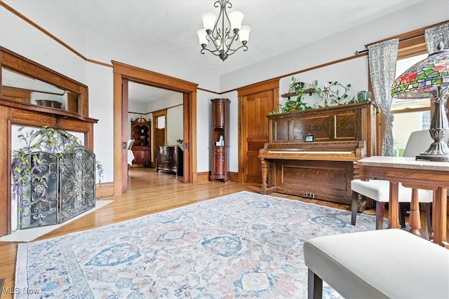201 E Spring St, Marietta, OH 45750 - sitting room featuring light wood-type flooring and a chandelier