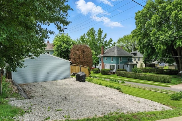 201 E Spring St, Marietta, OH 45750 - back of property featuring gravel driveway