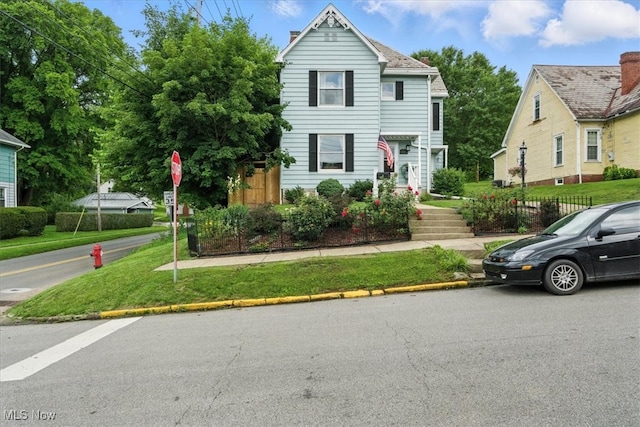 201 E Spring St, Marietta, OH 45750 - view of front of property featuring a chimney