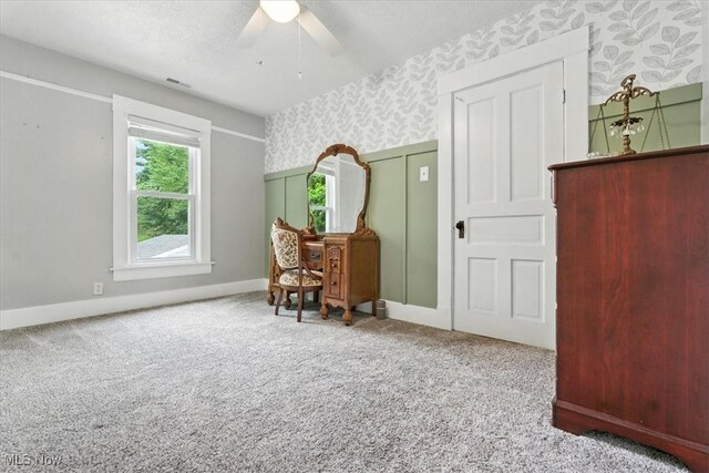 201 E Spring St, Marietta, OH 45750 - sitting room with wallpapered walls, ceiling fan, and carpet
