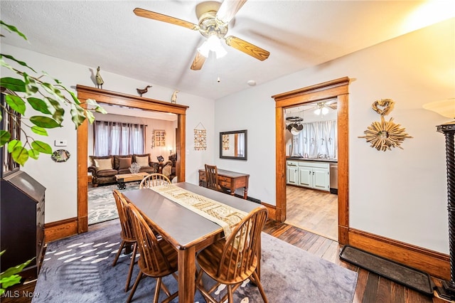 1833 W 7th St, Ashtabula, OH 44004 - dining space with ceiling fan and wood finished floors