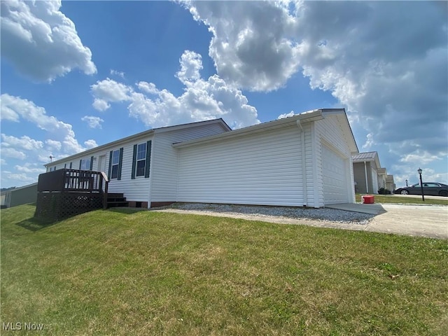 67330 Ebbert Rd Unit 9, Saint Clairsville, OH 43950 - view of property exterior with a lawn, a deck, an attached garage, and driveway