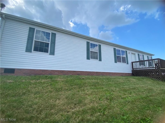 67330 Ebbert Rd Unit 9, Saint Clairsville, OH 43950 - view of property exterior with a wooden deck and a yard
