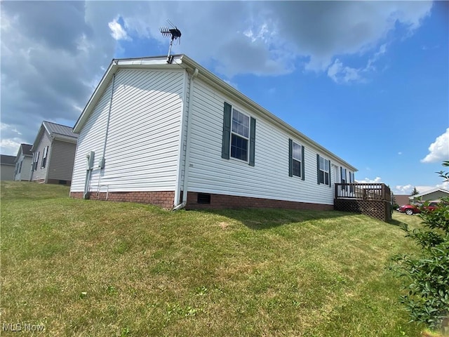 67330 Ebbert Rd Unit 9, Saint Clairsville, OH 43950 - view of side of property featuring a yard, a deck, and crawl space